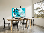 Turquoise Cosmos Bloom floral canvas print on the wall of a dining room