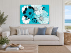 Turquoise Cosmos Bloom floral canvas print on the wall of a beach house living room