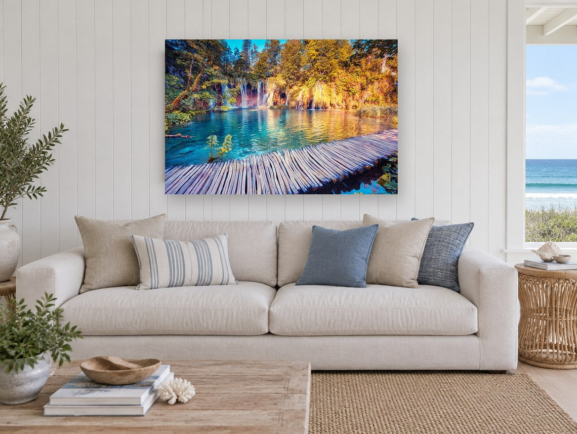 Turquoise Boardwalk Falls landscape canvas print on the wall of a beach house living room