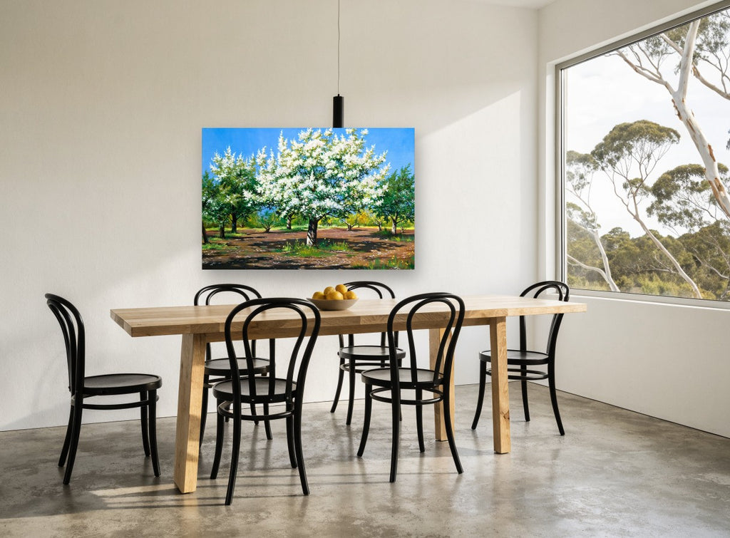 Orchard in White Blossom floral canvas print on the wall of a dining room