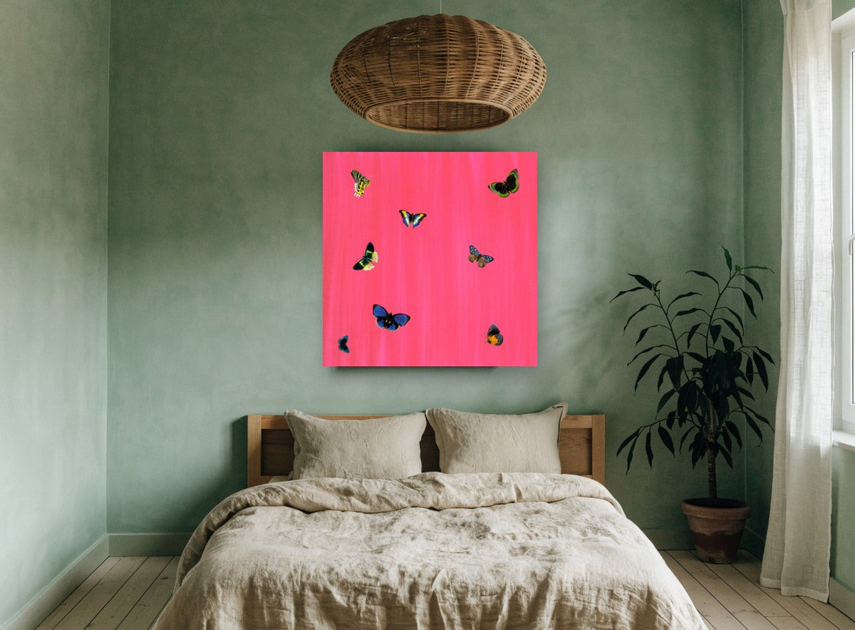 Butterflies on Hot Pink animal canvas print on the wall of a bedroom