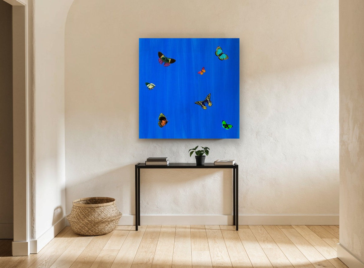 Butterflies on Cobalt animal canvas print on the wall of a hallway