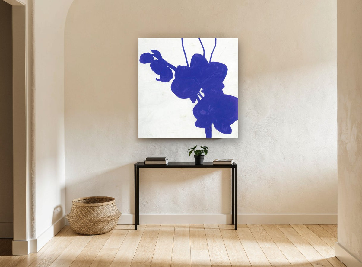 Indigo Orchid Silhouette floral canvas print on the wall of a hallway