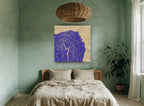 Violet Tree Rings floral canvas print on the wall of a bedroom