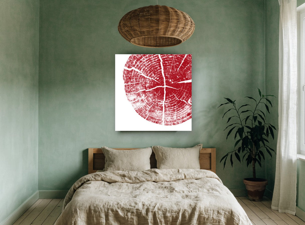 Crimson Tree Rings floral canvas print on the wall of a bedroom