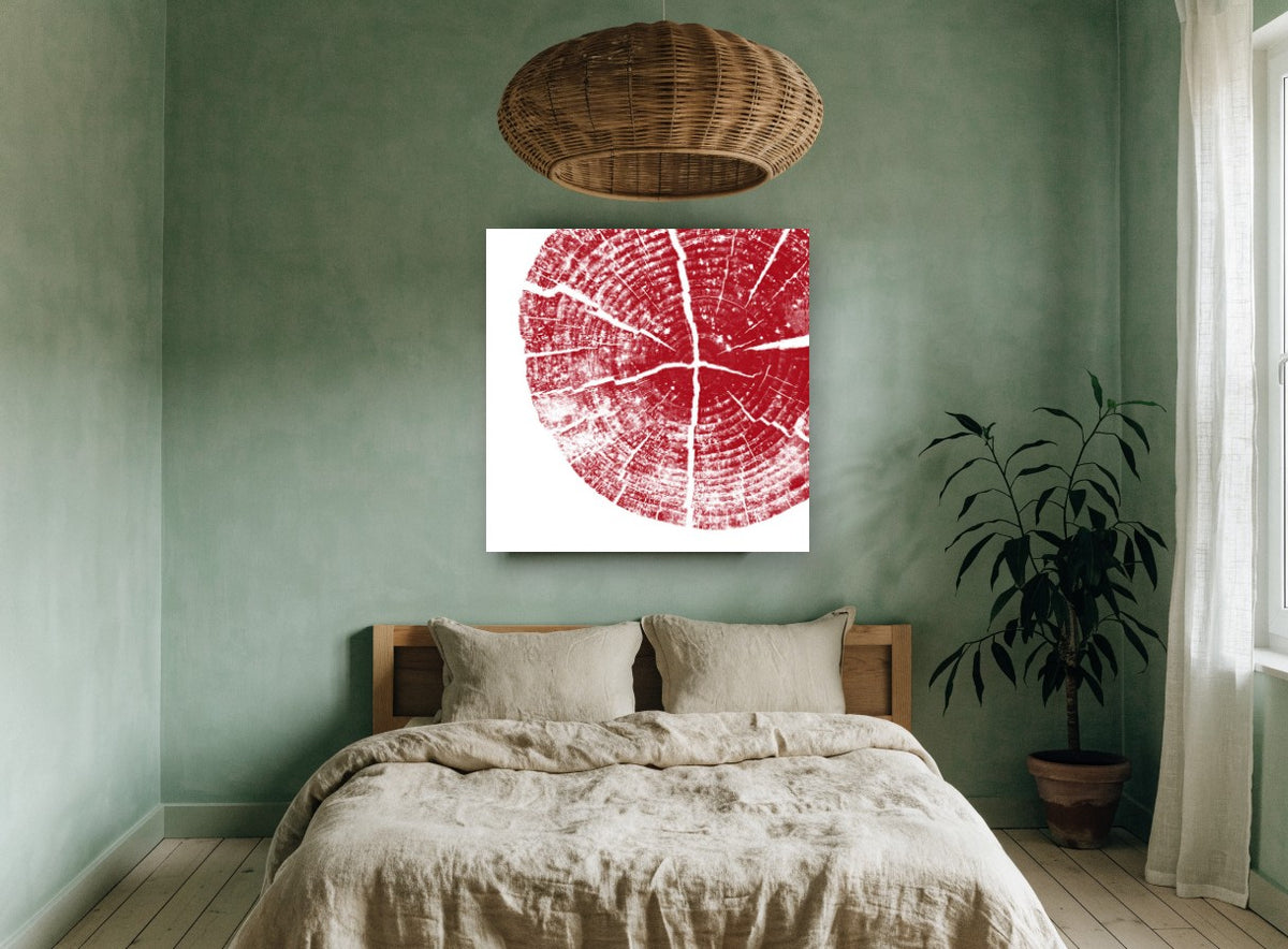 Crimson Tree Rings floral canvas print on the wall of a bedroom