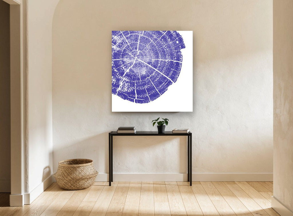 Indigo Tree Rings floral canvas print on the wall of a hallway