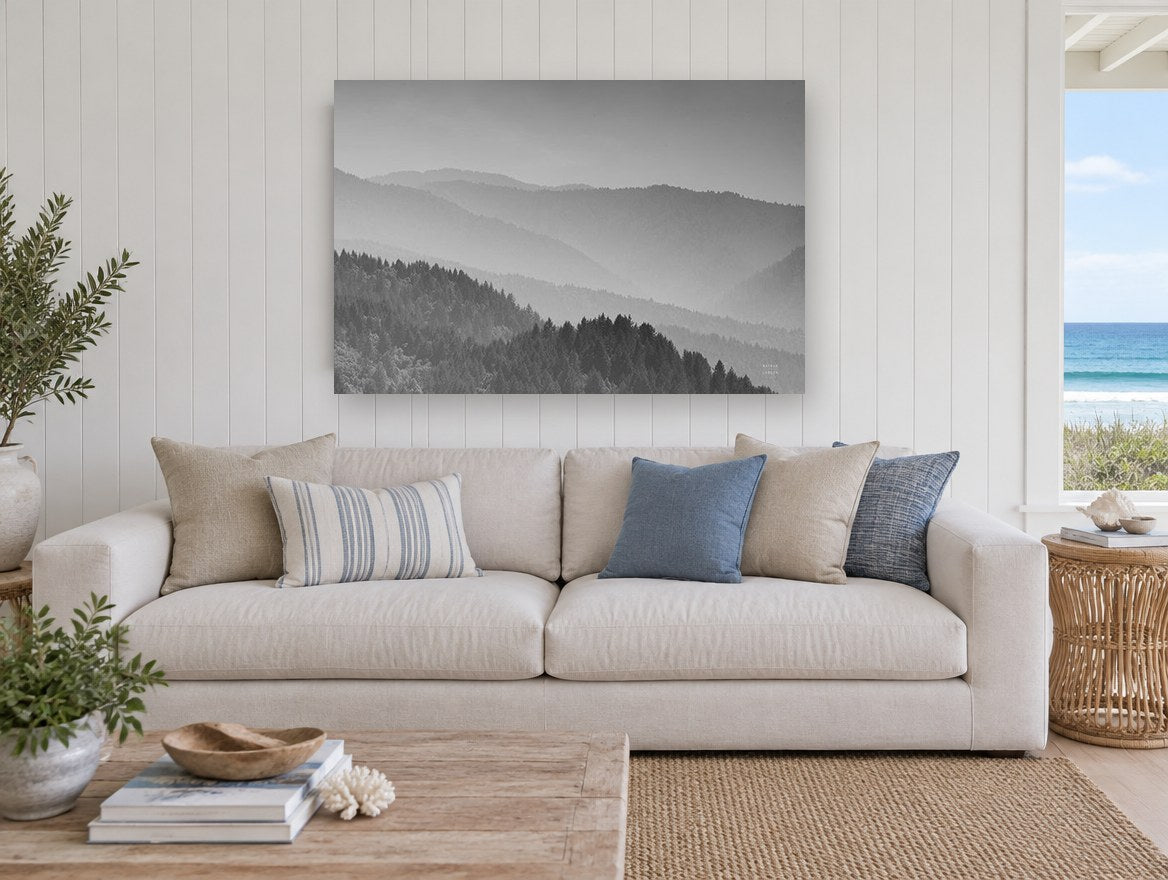 Layered Ridge Haze landscape canvas print on the wall of a beach house living room