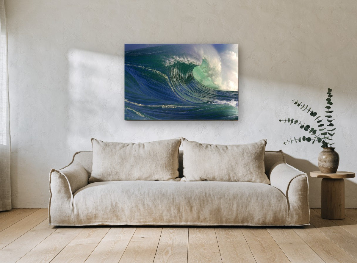 Curling Emerald Barrel coastal canvas print on the wall of a living room