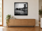 Pier Tower at Dusk coastal canvas print on the wall of a living room above a sideboard