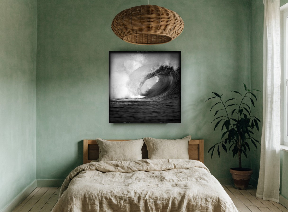 Hollow Barrel Wave coastal canvas print on the wall of a bedroom