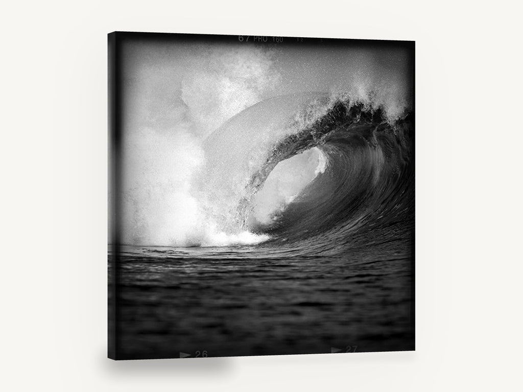 Hollow Barrel Wave, black and white barrelling wave photograph, coastal canvas wall art print ready to hang