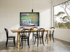 Lifeguard Tower Neon Haze coastal canvas print on the wall of a dining room