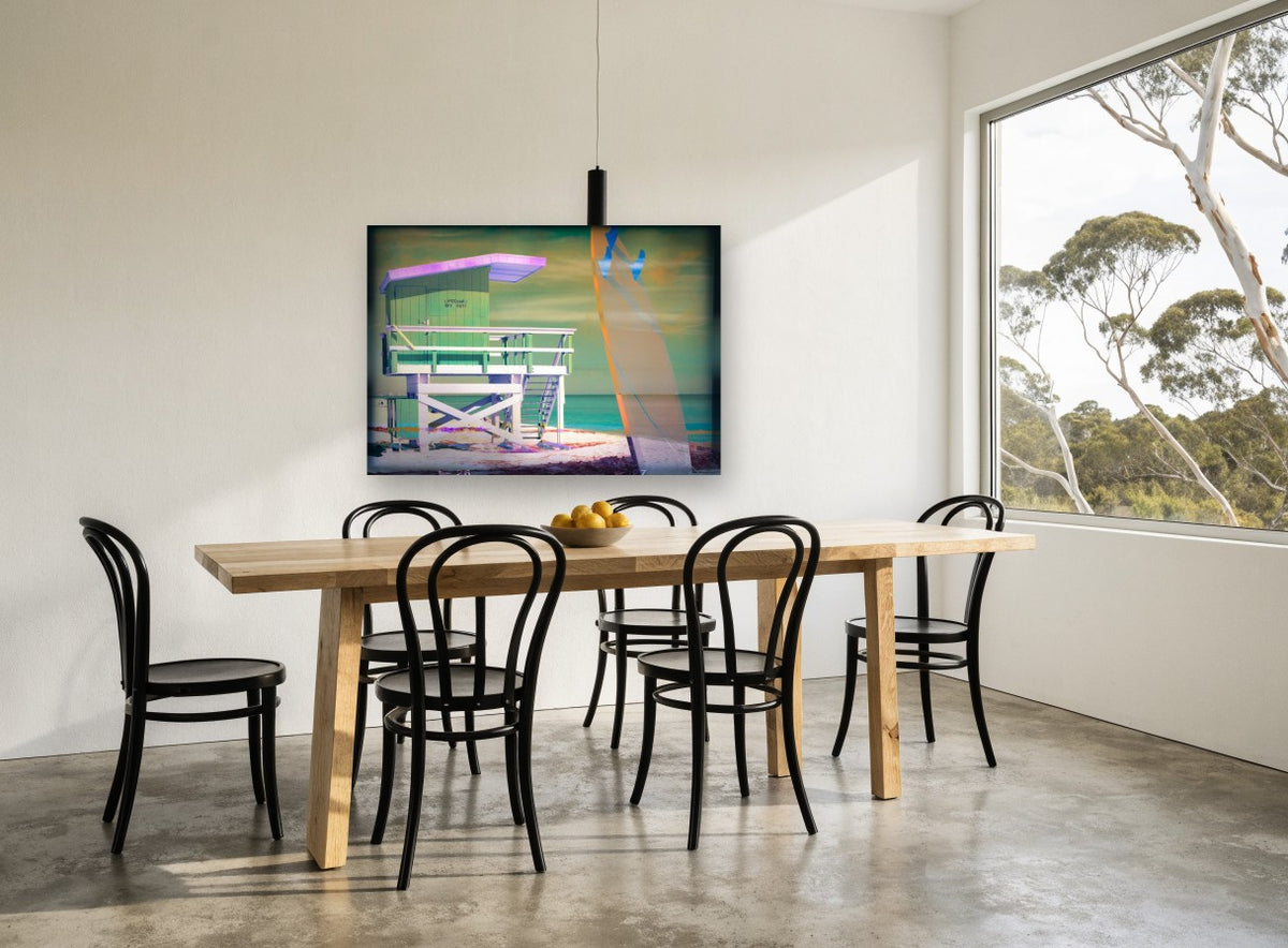 Lifeguard Tower Neon Haze coastal canvas print on the wall of a dining room