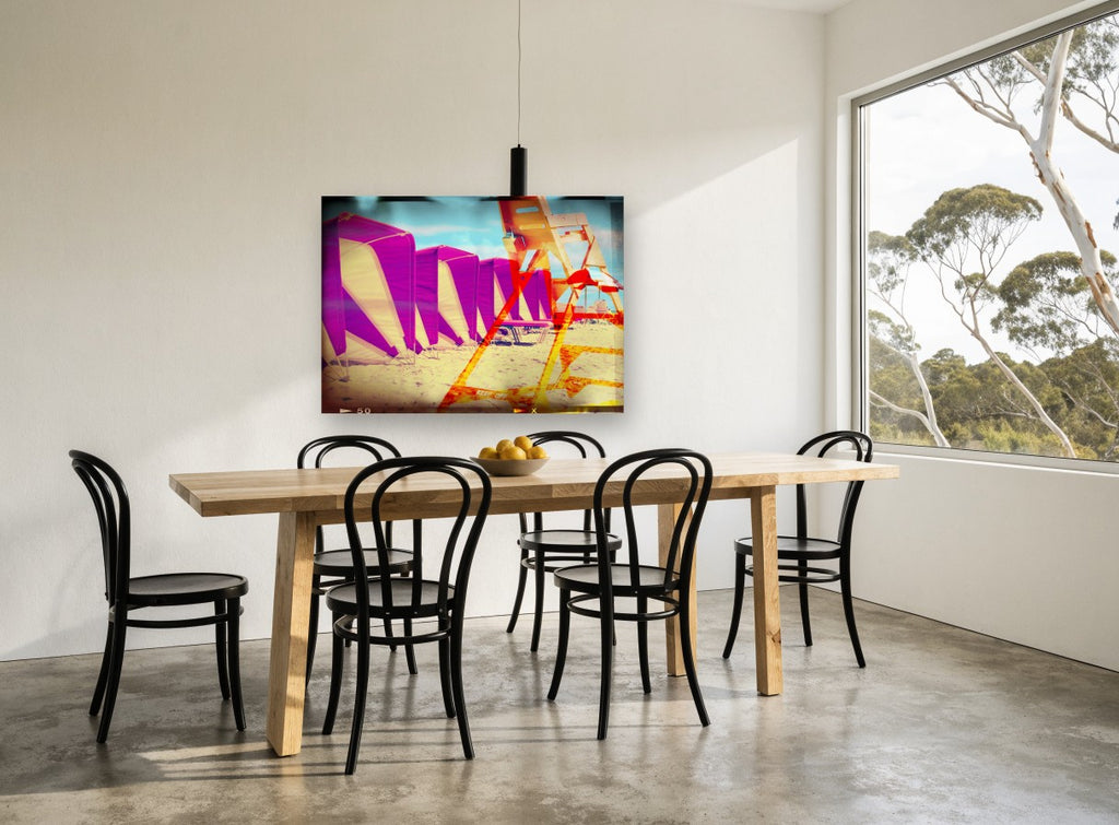 Magenta Cabanas Lifeguard Tower coastal canvas print on the wall of a dining room