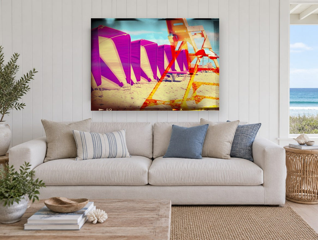 Magenta Cabanas Lifeguard Tower coastal canvas print on the wall of a beach house living room