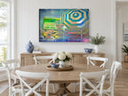 Neon Lifeguard Hut coastal canvas print on the wall of a Hamptons dining room