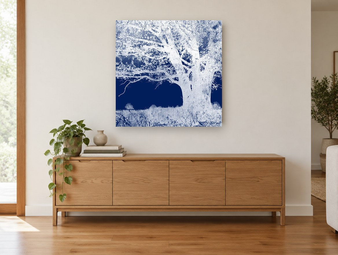 Inverted Indigo Oak landscape canvas print on the wall of a living room above a sideboard