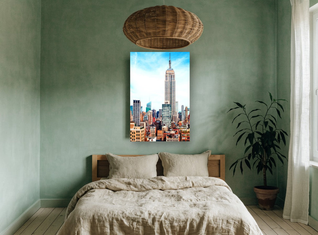 Empire State Rising city canvas print on the wall of a bedroom