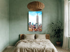 Empire State Rising city canvas print on the wall of a bedroom