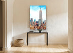Empire State Rising city canvas print on the wall of a hallway