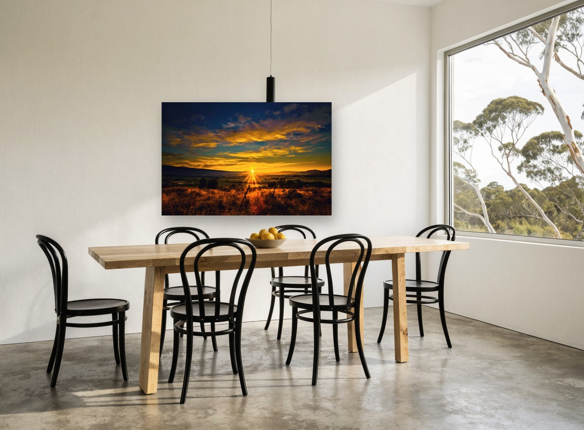 Valley Sunburst landscape canvas print on the wall of a dining room