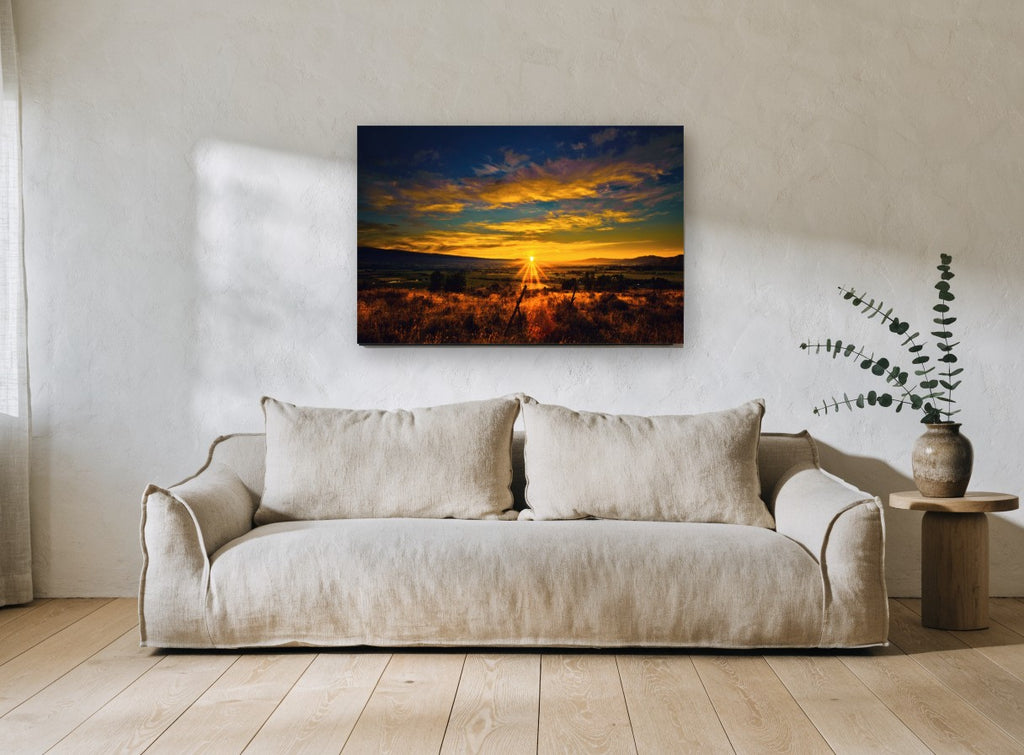 Valley Sunburst landscape canvas print on the wall of a living room