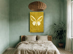 Ochre Butterfly Plate animal canvas print on the wall of a bedroom