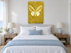 Ochre Butterfly Plate animal canvas print on the wall of a bedroom