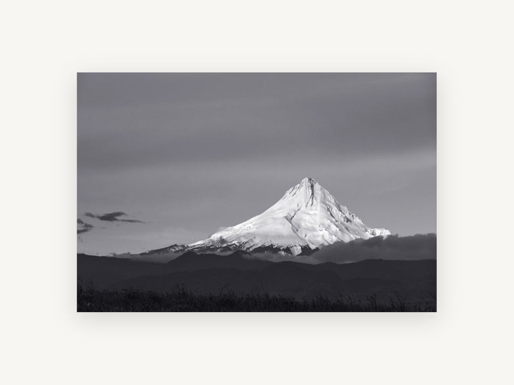 Lit Peak Dusk, snowy mountain peak black and white photograph, landscape canvas wall art print, front view