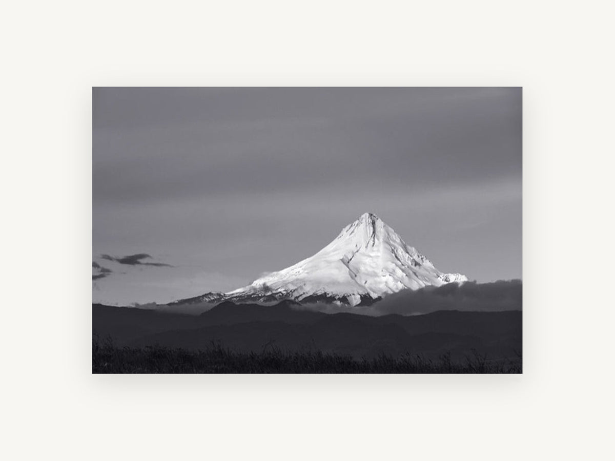 Lit Peak Dusk, snowy mountain peak black and white photograph, landscape canvas wall art print, front view