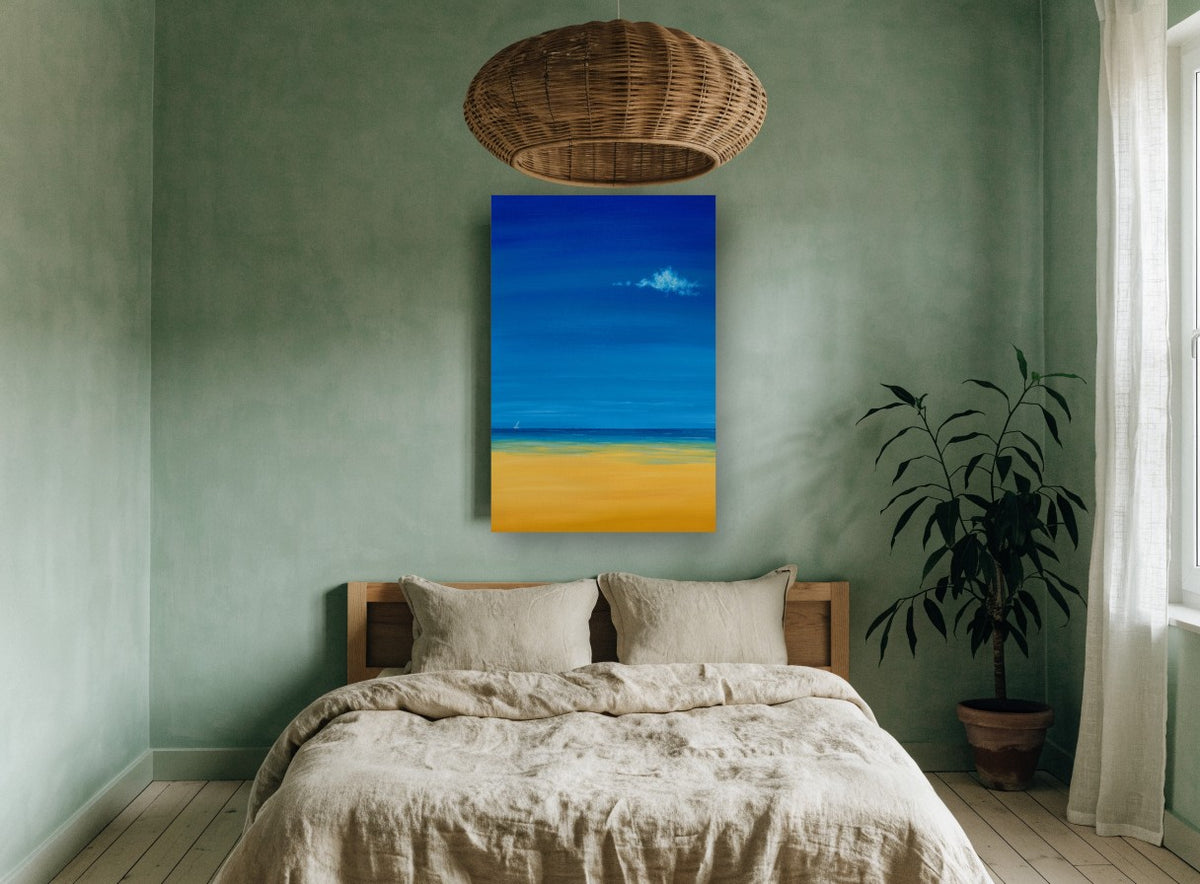 Lone Sail Calm coastal canvas print on the wall of a bedroom