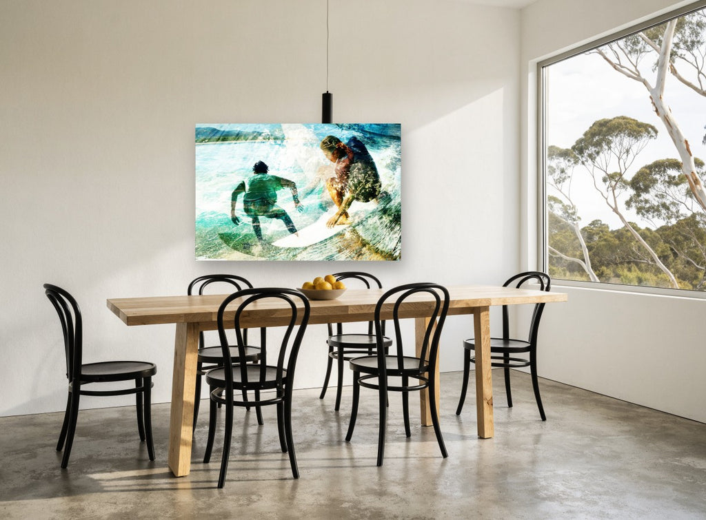 Twin Surfers Double Exposure coastal canvas print on the wall of a dining room