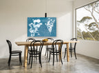 Blue Print Meadow Stems floral canvas print on the wall of a dining room