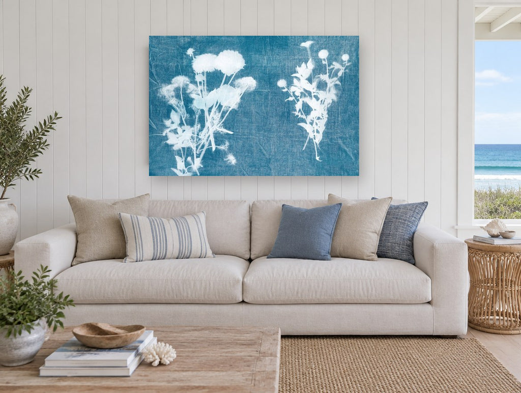 Blue Print Meadow Stems floral canvas print on the wall of a beach house living room