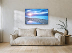 Pebble Shore Dusk coastal canvas print on the wall of a living room