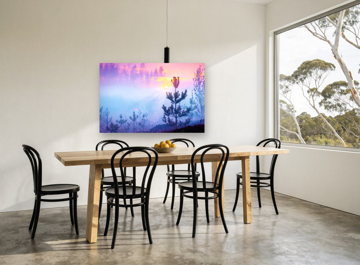Pink Dawn Pines landscape canvas print on the wall of a dining room