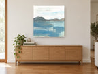 Misty Headland Shore coastal canvas print on the wall of a living room above a sideboard