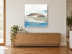 Misty Headland Haze coastal canvas print on the wall of a living room above a sideboard