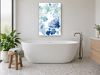 Blue Petal Drift floral canvas print on the wall of a bathroom
