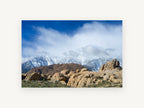 Boulders Beneath Snow Peaks, snowy mountains rocky boulders photograph, landscape canvas wall art print, front view