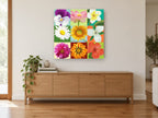 Nine Bloom Colour Grid floral canvas print on the wall of a living room above a sideboard