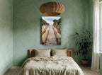 Stairway to the Shore coastal canvas print on the wall of a bedroom