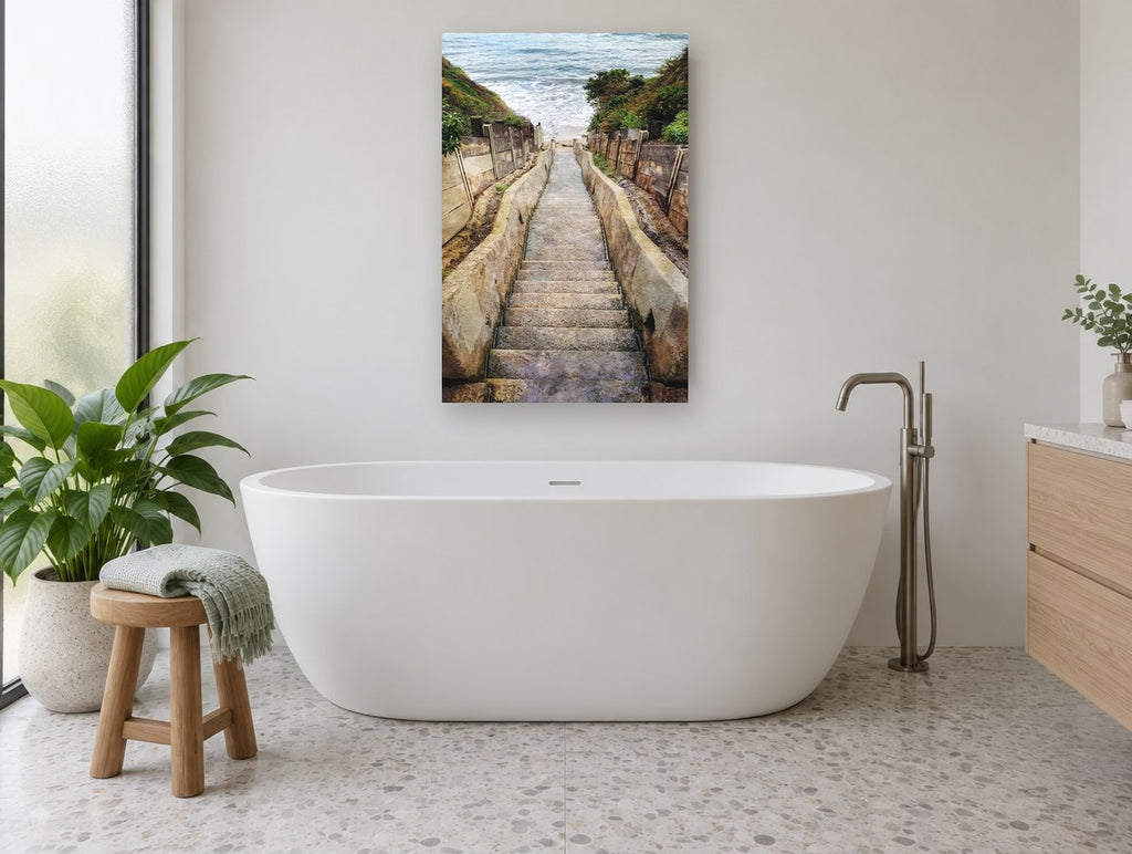 Stairway to the Shore coastal canvas print on the wall of a bathroom