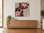 Walnut Anemone Duo floral canvas print on the wall of a living room above a sideboard
