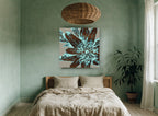 Aqua Fringed Starburst floral canvas print on the wall of a bedroom