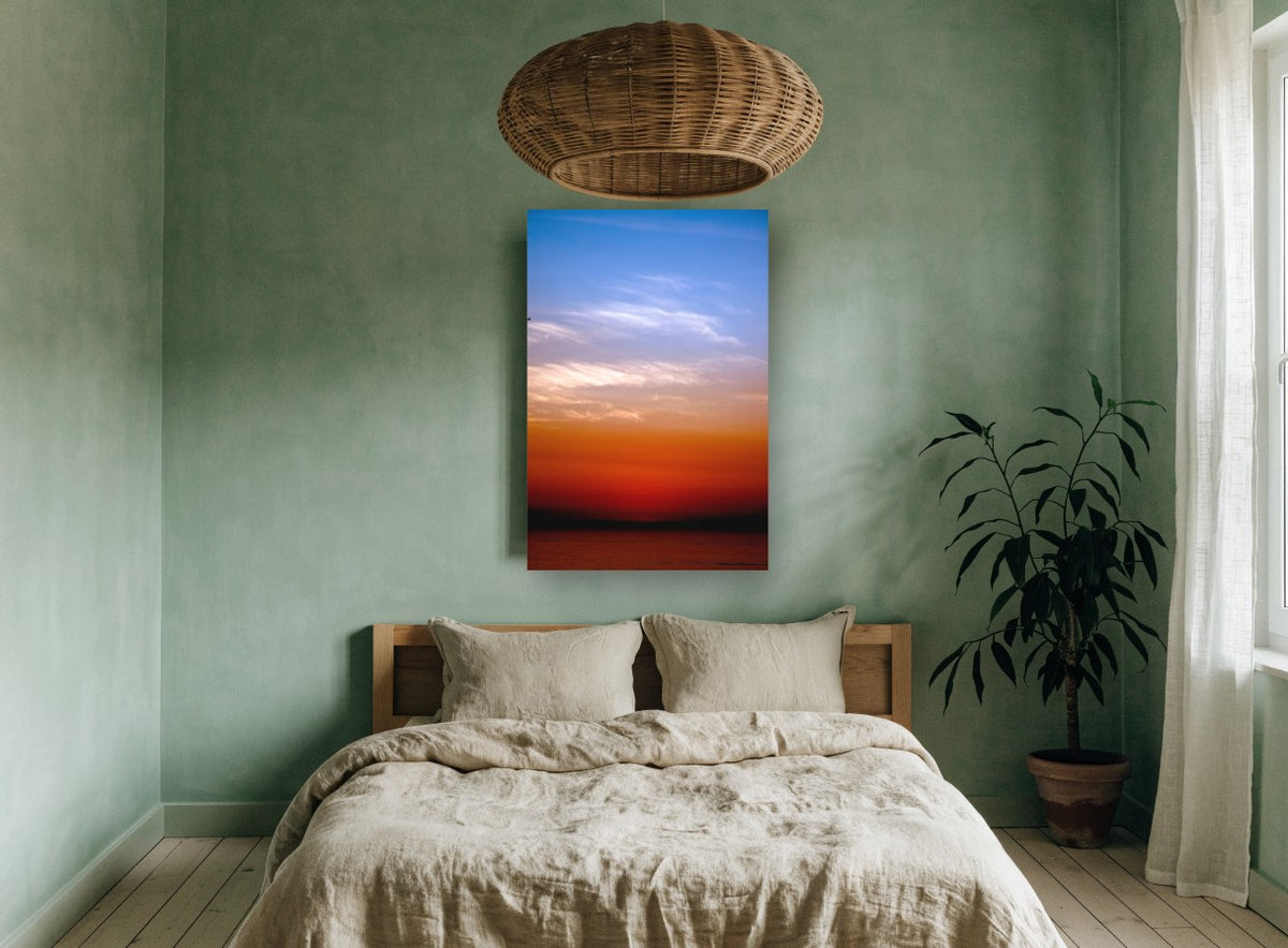 Lone Bird Dusk coastal canvas print on the wall of a bedroom