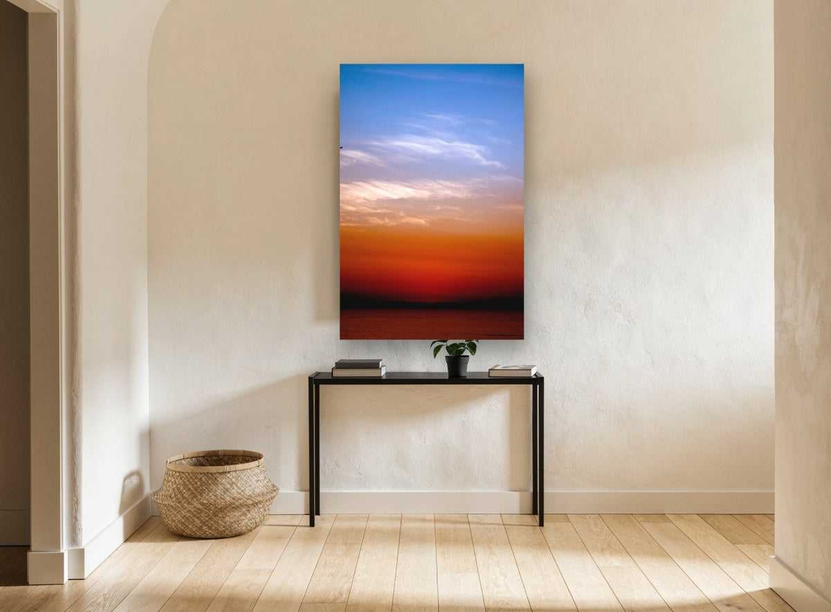 Lone Bird Dusk coastal canvas print on the wall of a hallway