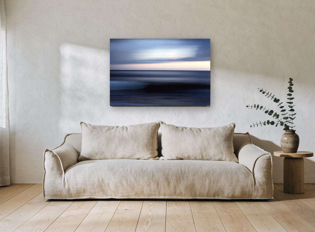 Dusk Blur Horizon coastal canvas print on the wall of a living room