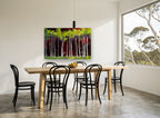 Birches Against Crimson landscape canvas print on the wall of a dining room